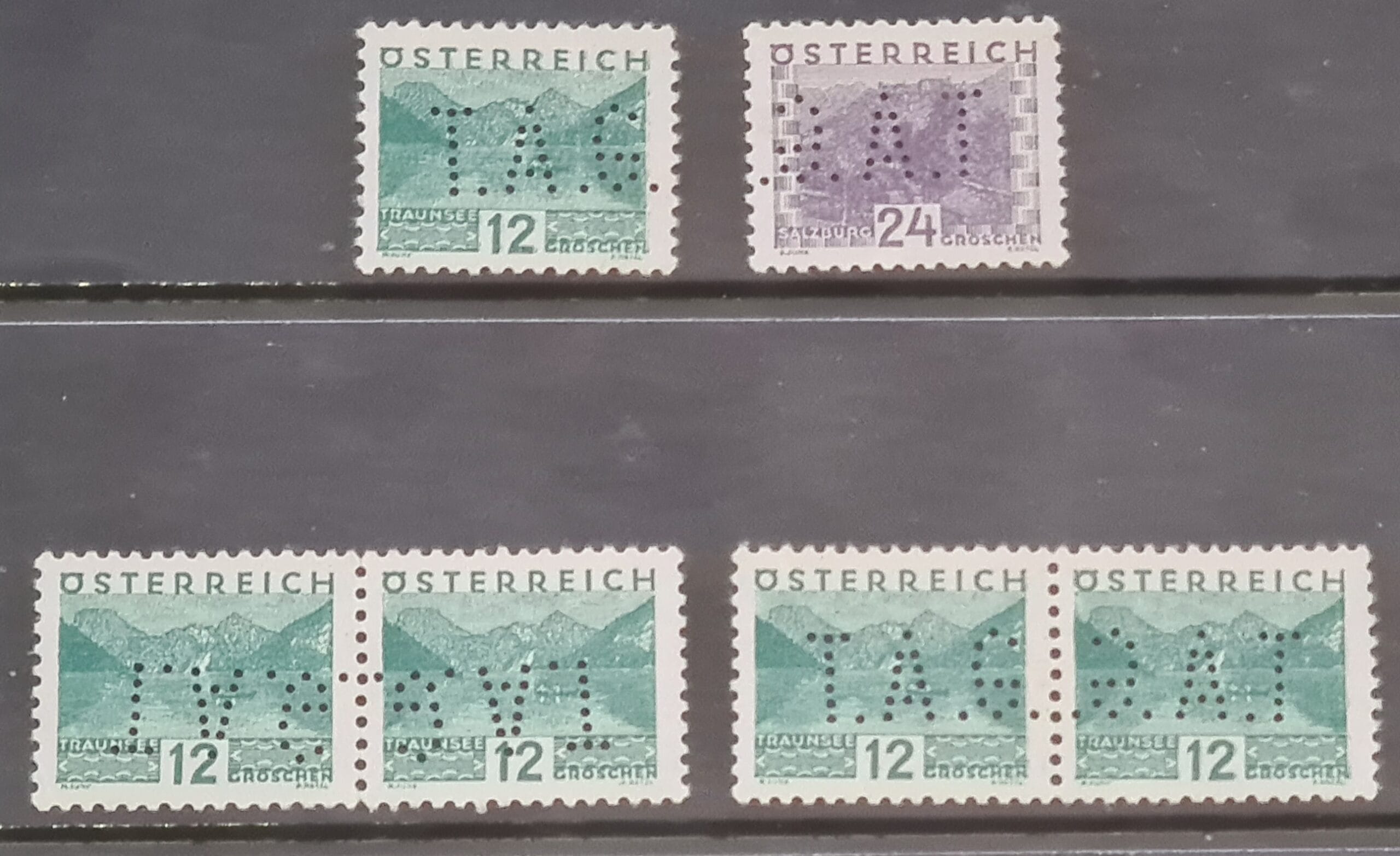 Austria 1932 SG679/683 Perfin. T.A.G MNH